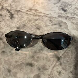 Vintage Polaroid Lookers Black Oval Sunglasses unisex